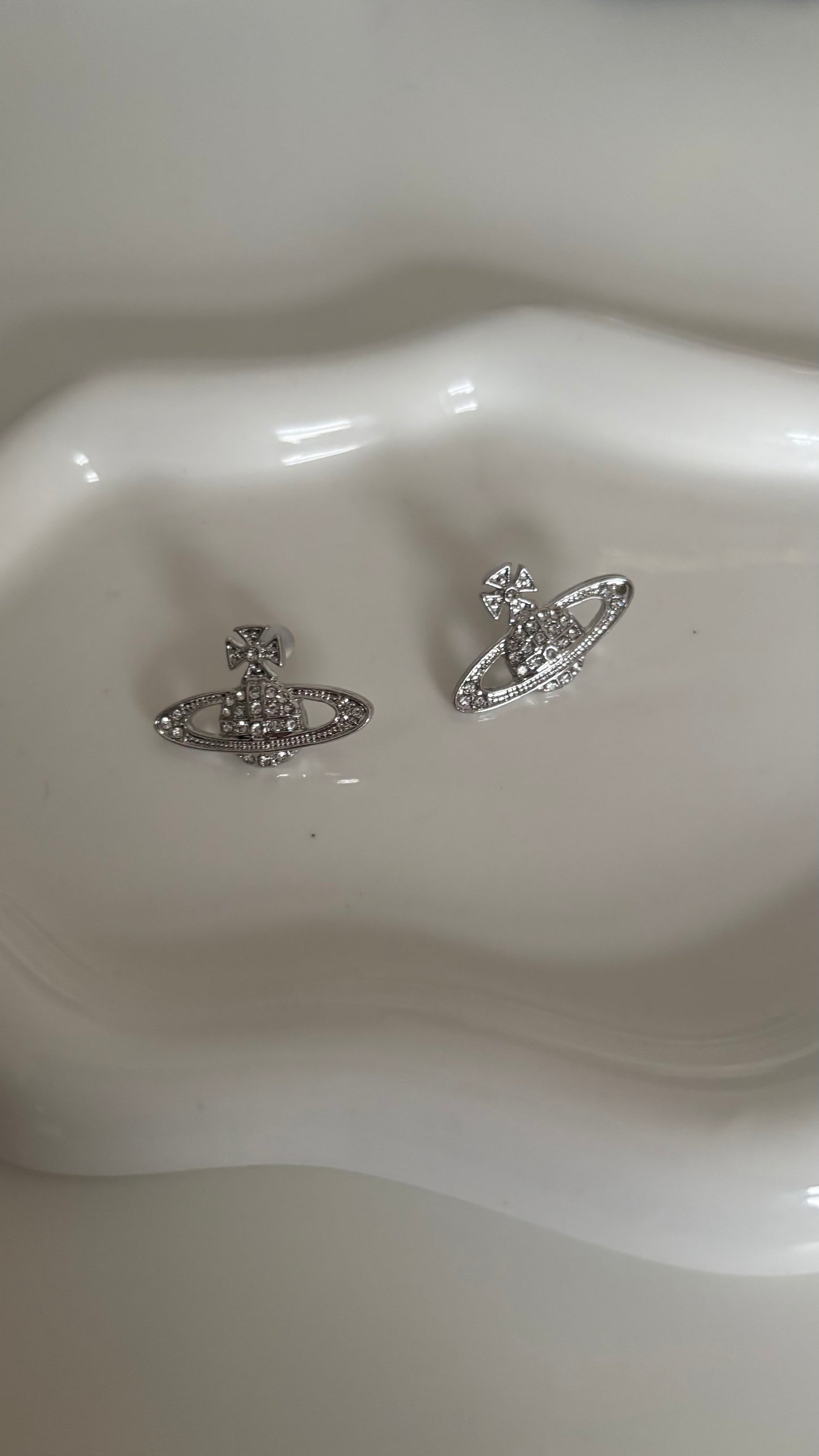 Silver Saturn earrings