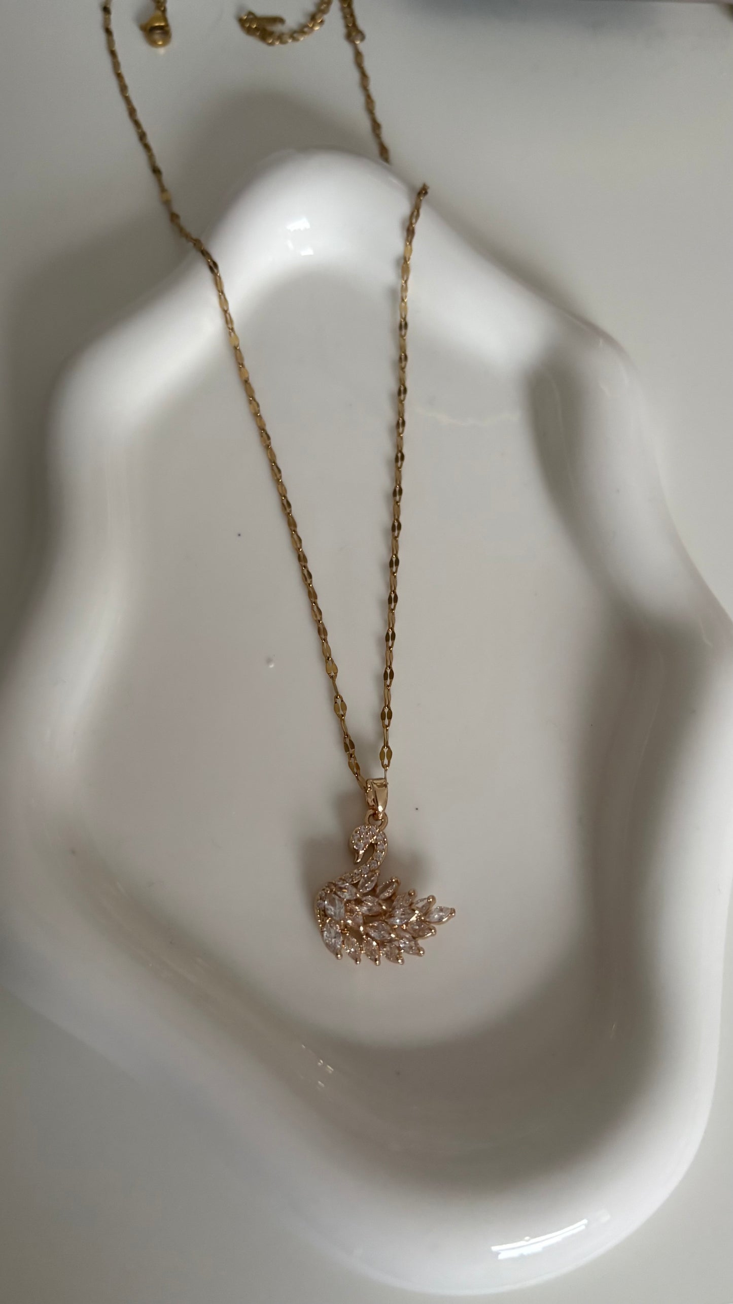 Gold swan necklace