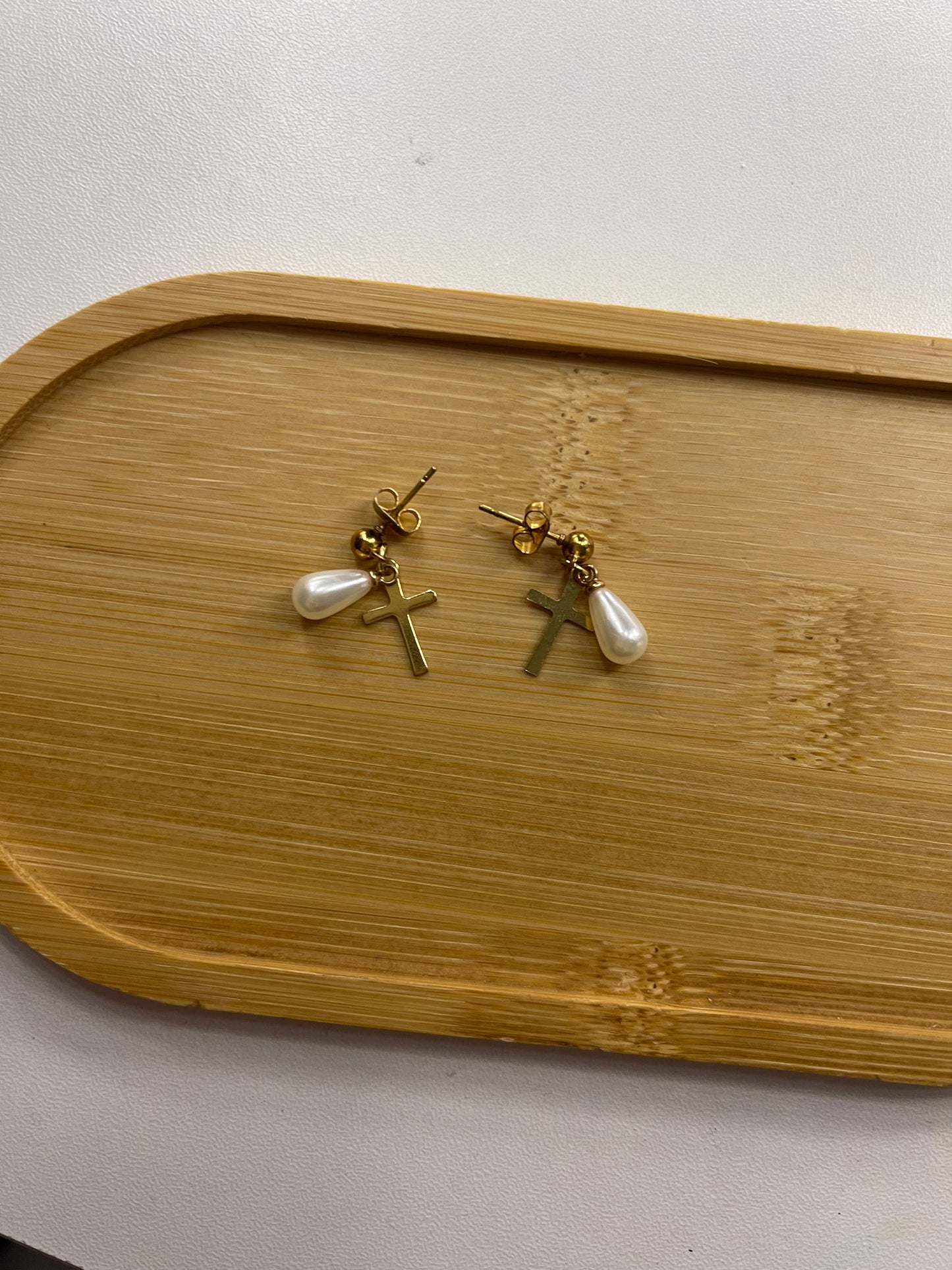 cross and pearl earrings