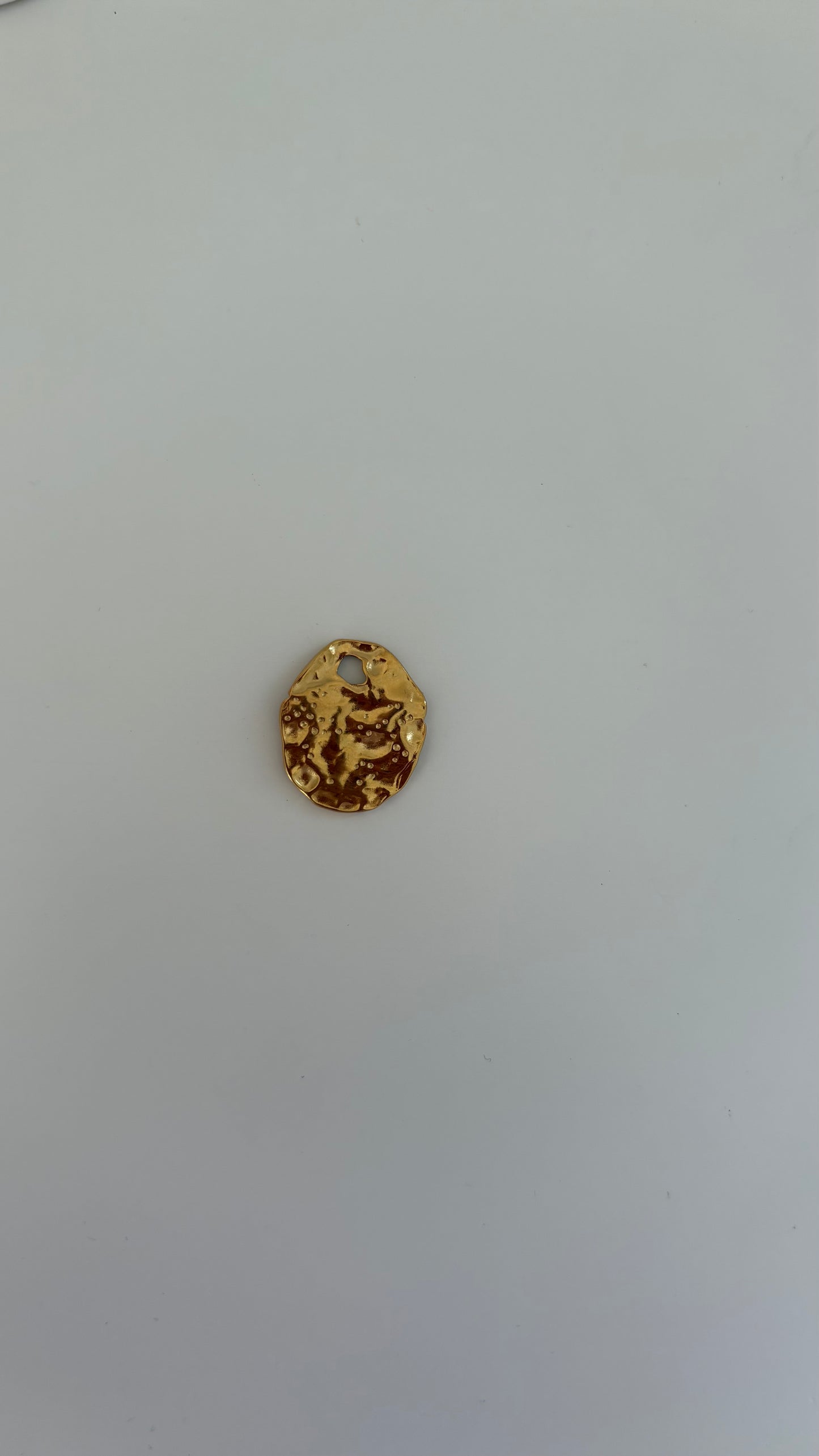 Large textured gold circle charm