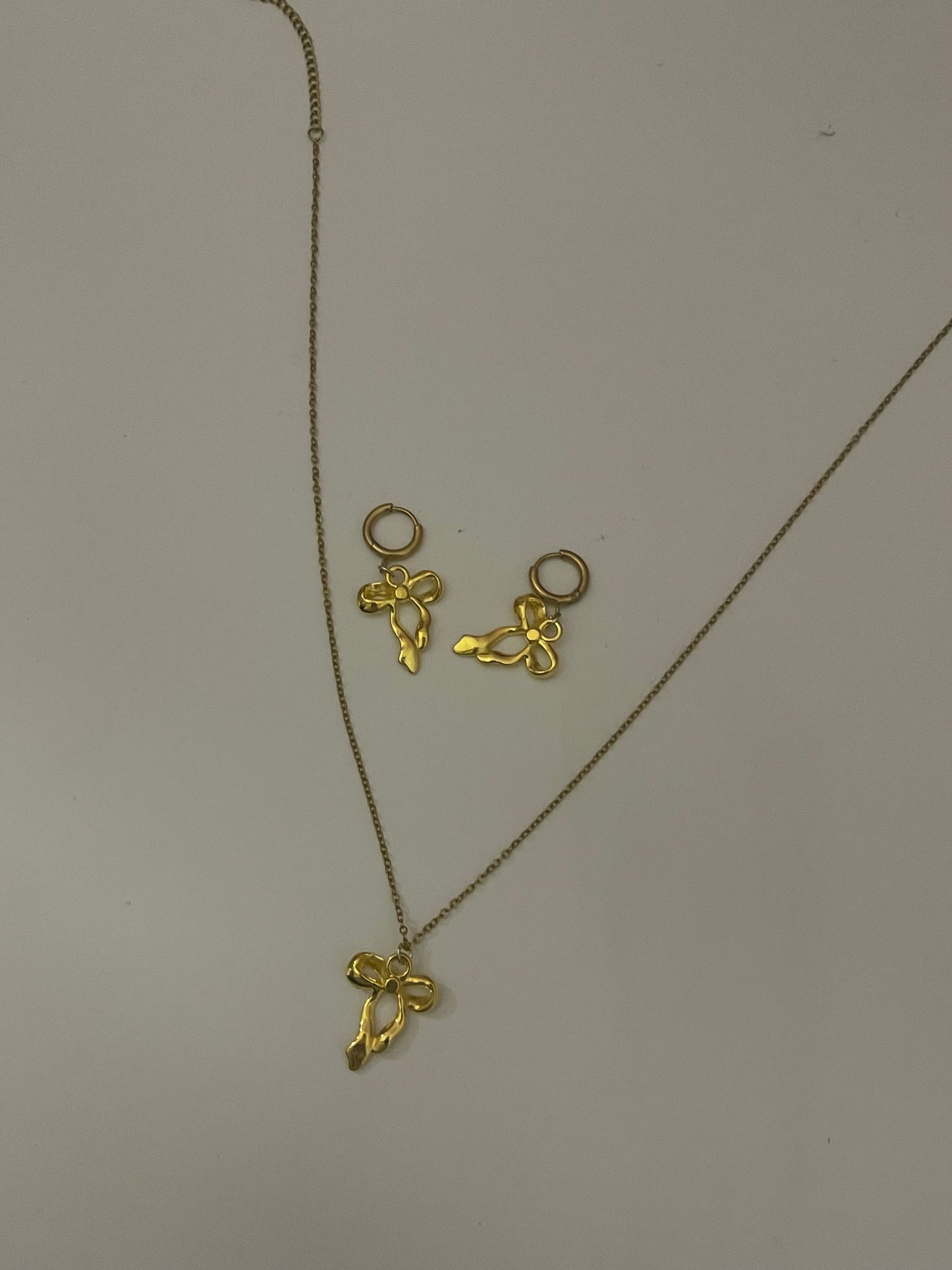 gold bow earrings and necklace set