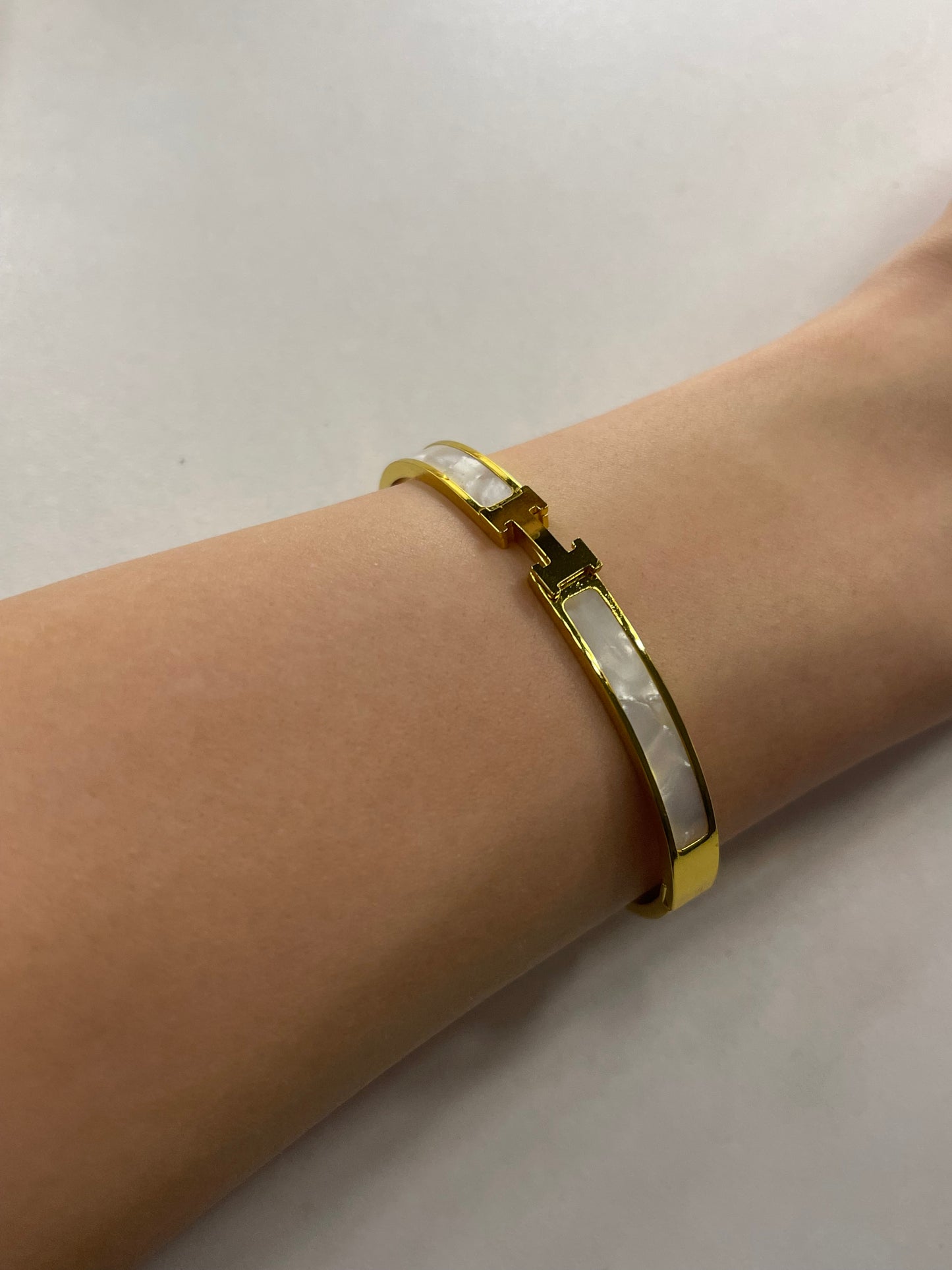 white and gold H bangle (pre order)