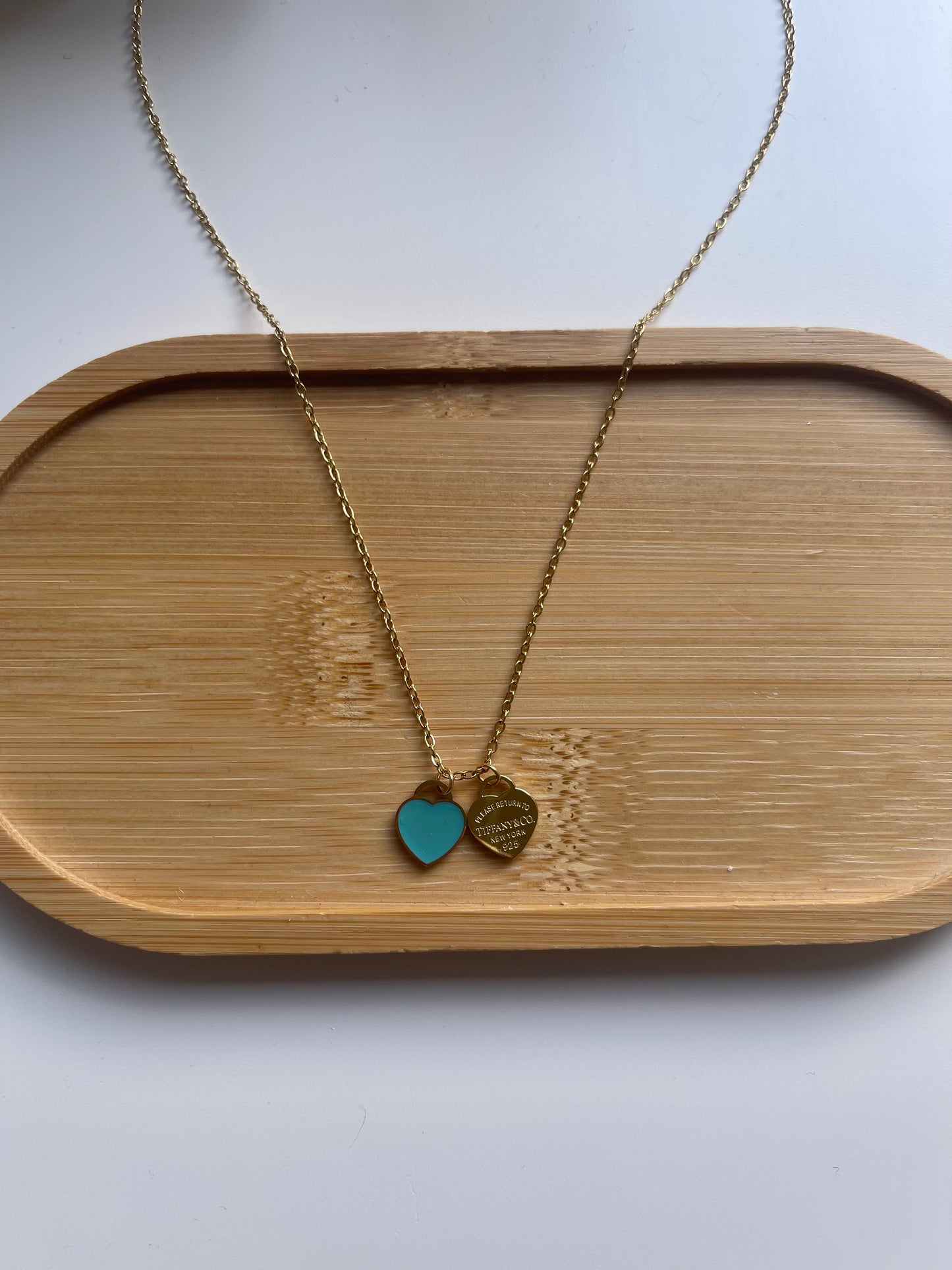 Blue and gold double heart necklace