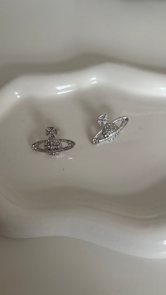 Silver Saturn earrings