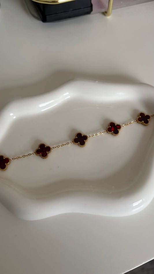 Burgundy and gold clover bracelet