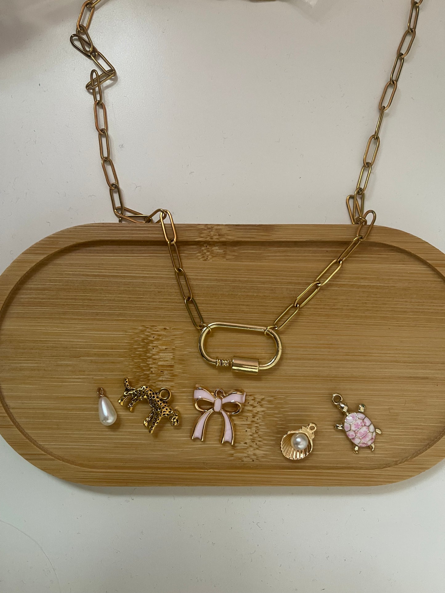 interchangeable charm necklace gold and pink bow