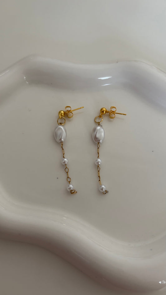 Gold pearl dangle earrings