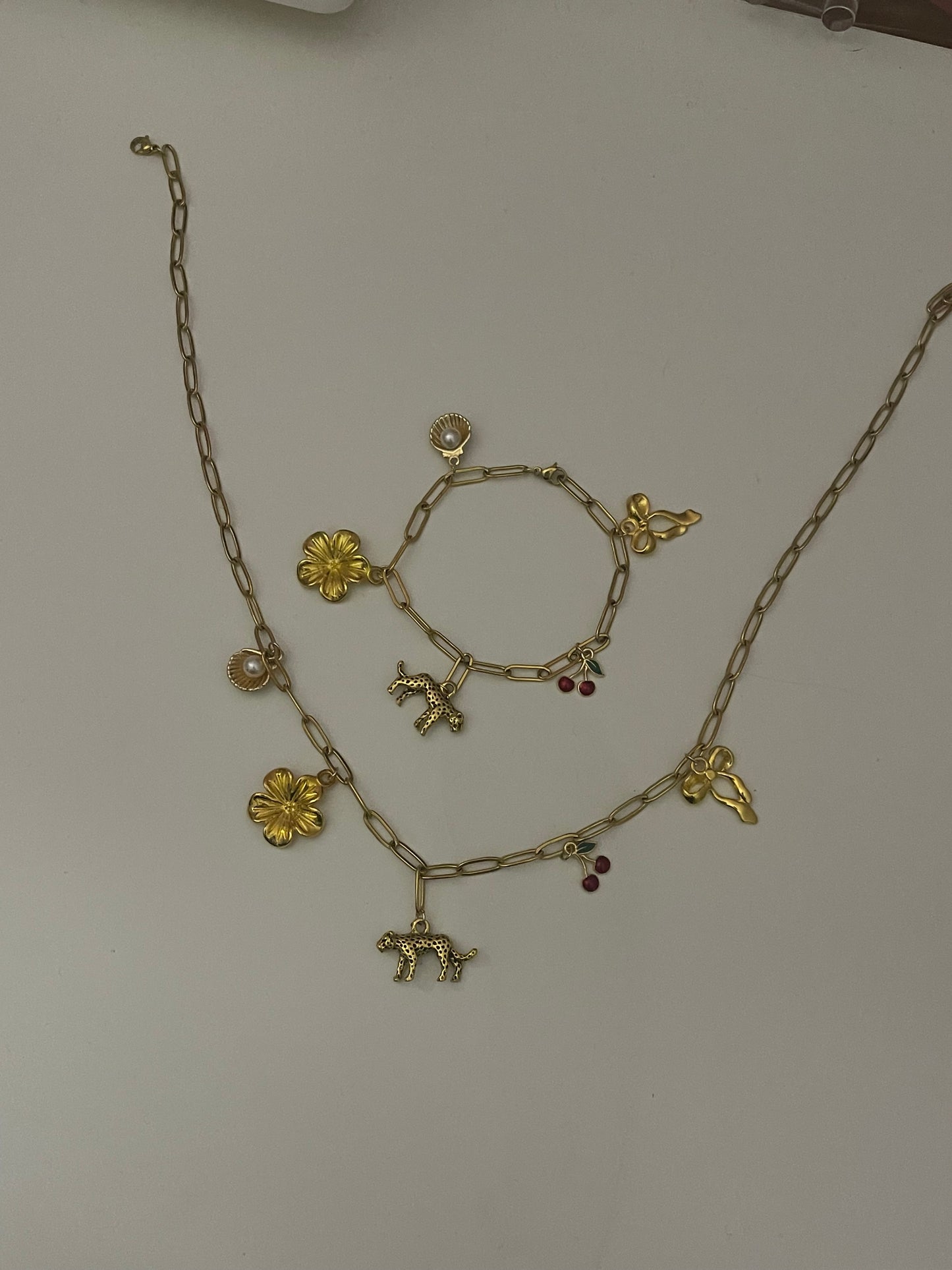 cheetah and cherry gold bracelet and necklace set
