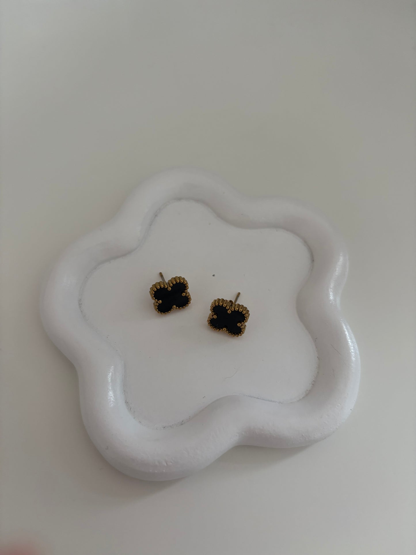 Black and gold clover earrings