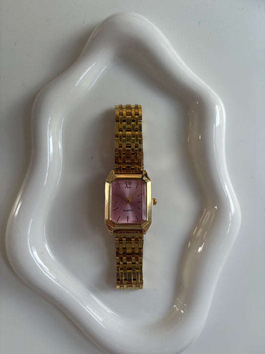 Pink faced gold watch