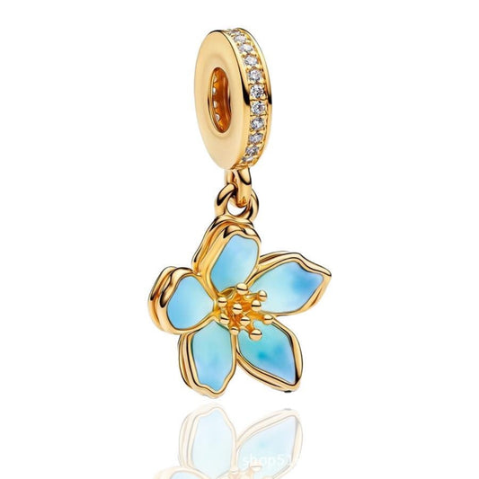 Gold and blue cherry blossom charm