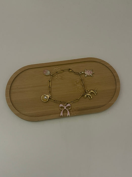 pink and gold bow bracelet