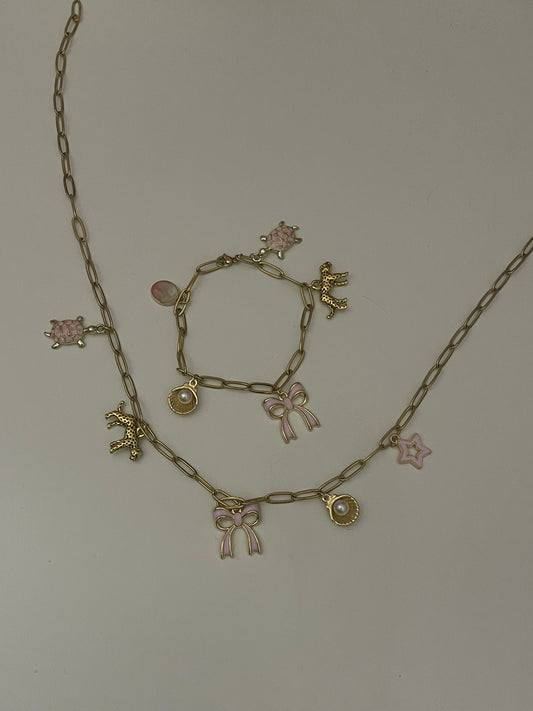 pink and gold bracelet and necklace set