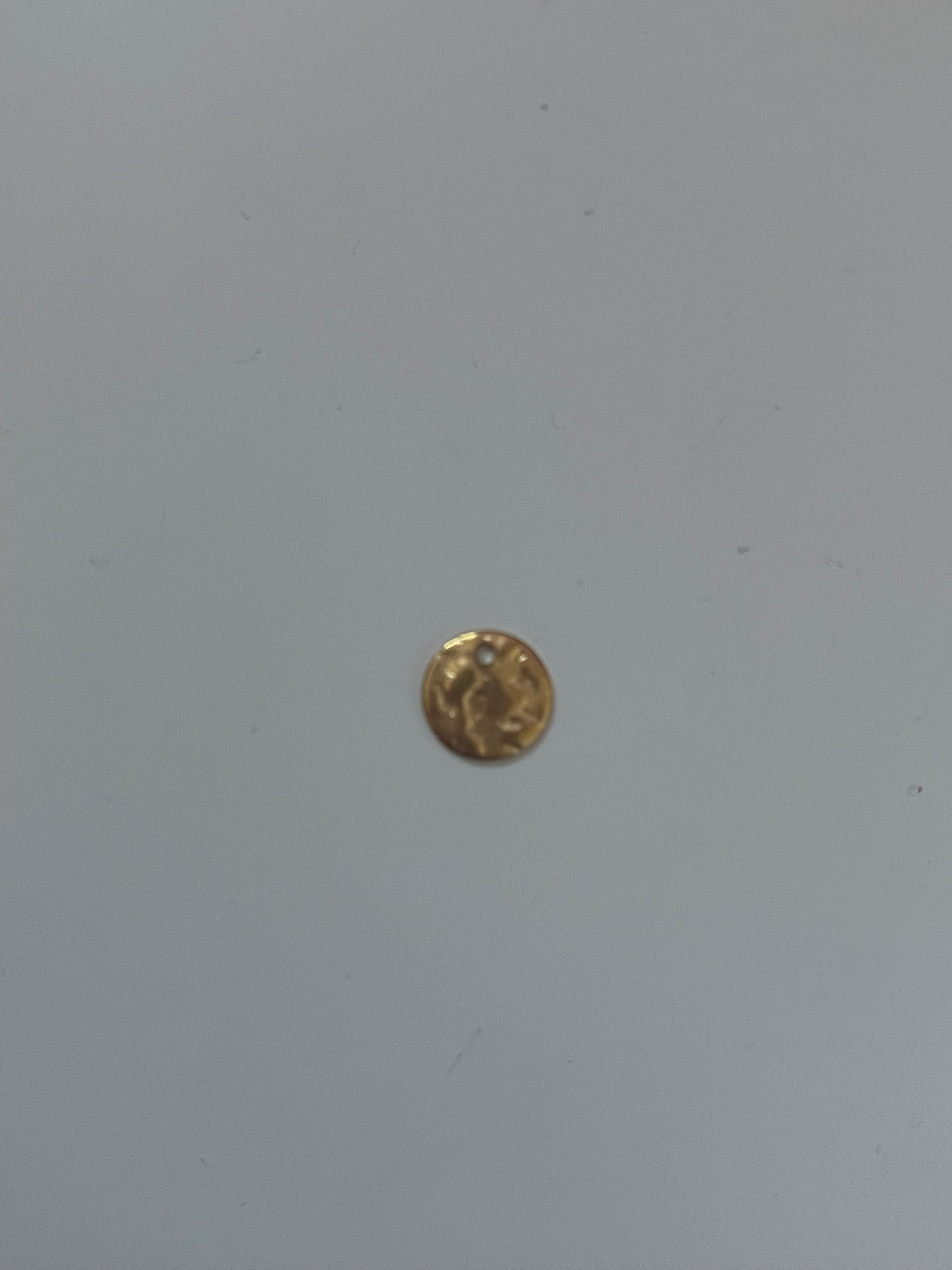 textured circle charm