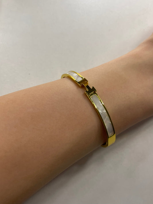 white and gold H bangle (pre order)