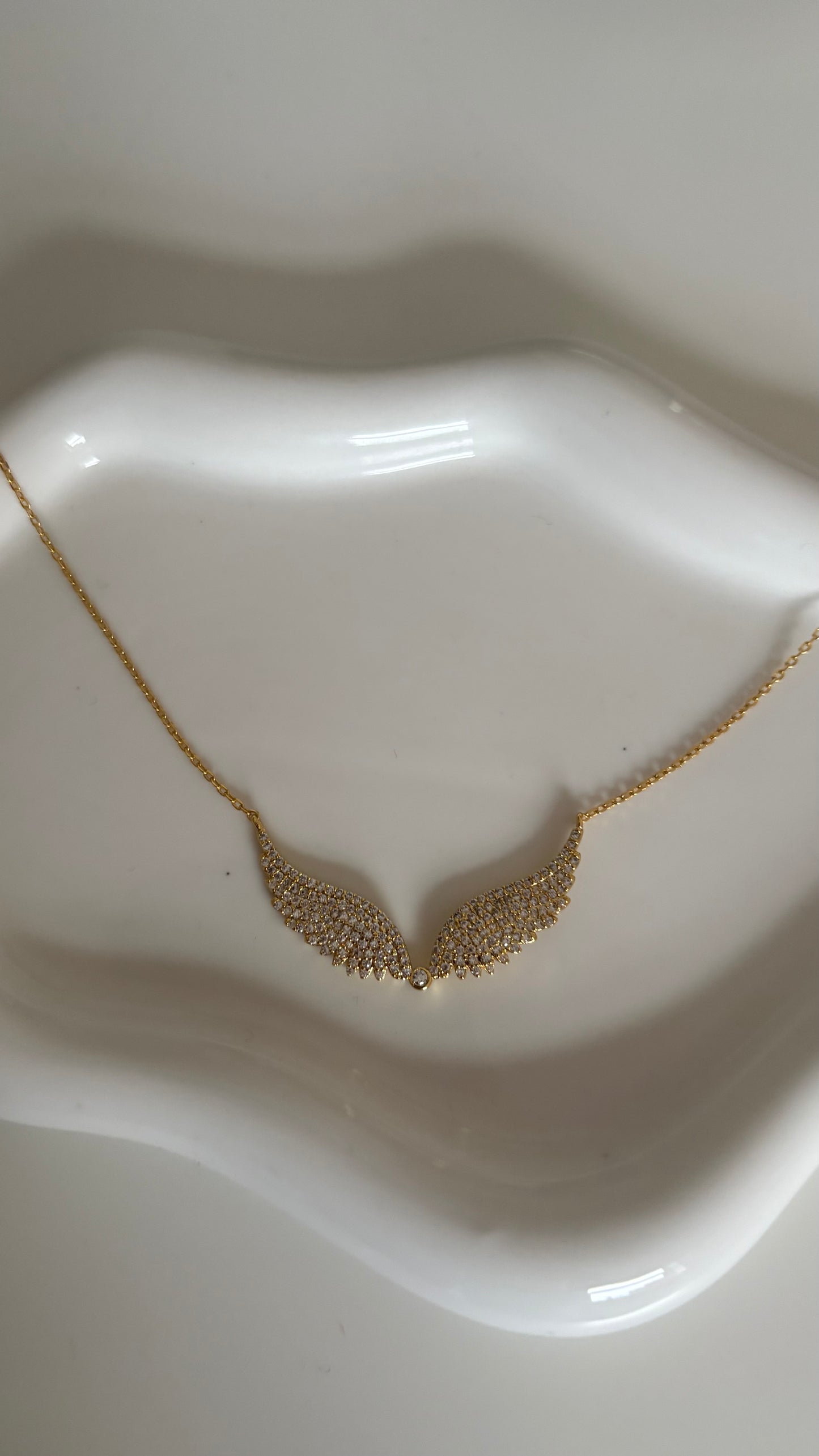 Gold angel wings necklace